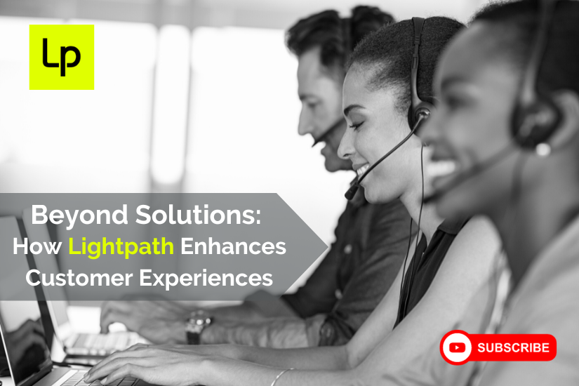 Beyond Solutions: How Lightpath Enhances Customer Experience. Employee wearing headsets smiling at work with Lighpath logo